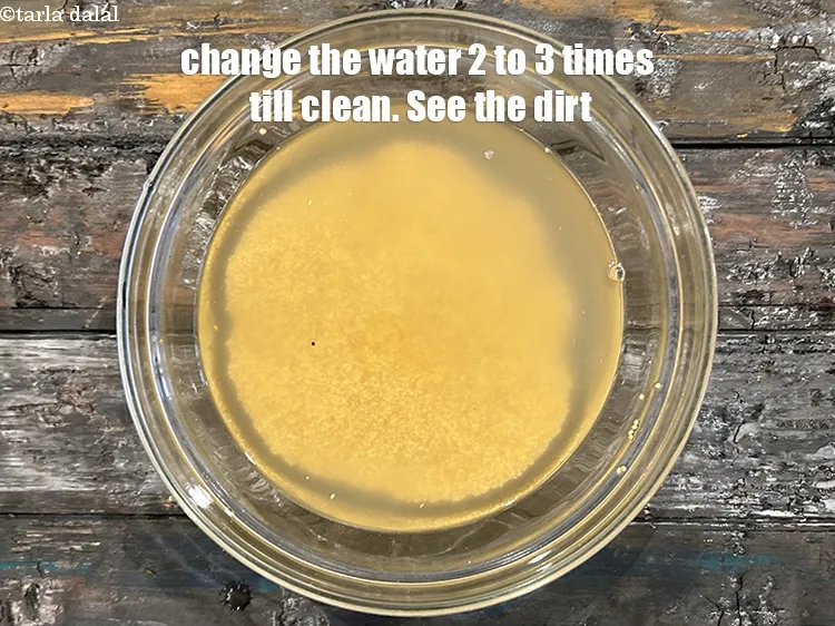 Step 6 – Change water 2 to 3 times to clean the millets. See the dirt.