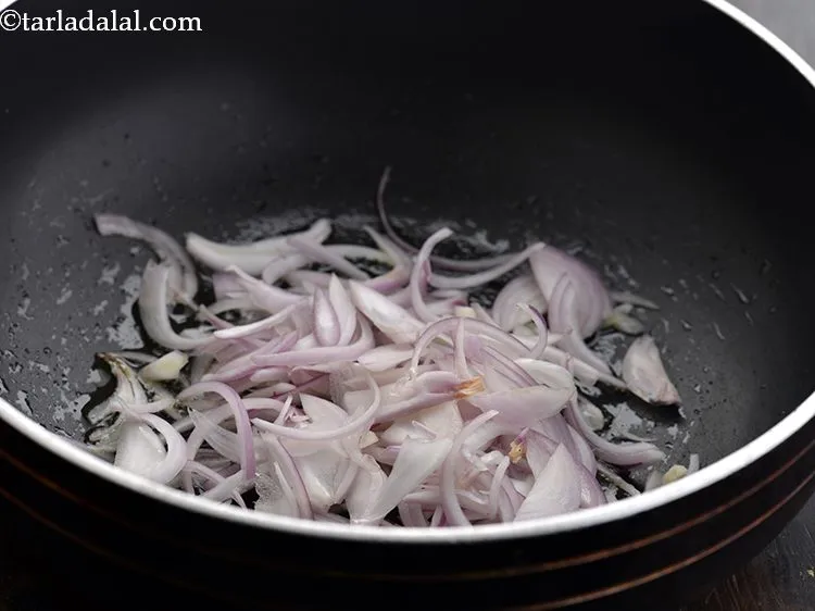 Step 3 – Once the oil is hot, add the onions.