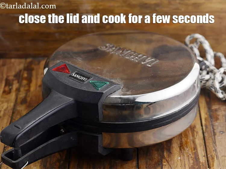 Step 41 – <meta charset="UTF-8" /> Close the lid and cook for a few seconds.&nbsp;