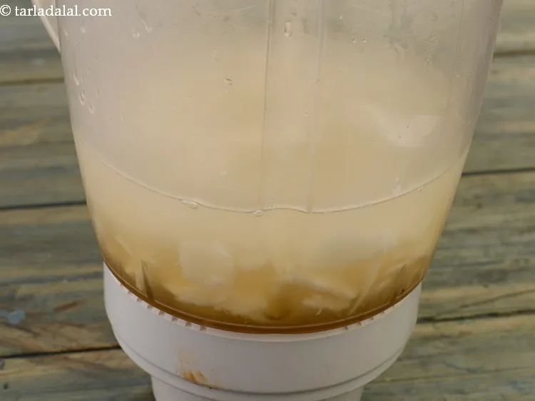Step 5 – These are all the ingredients of <strong>coconut water orange drink</strong> in the mixer jar.
