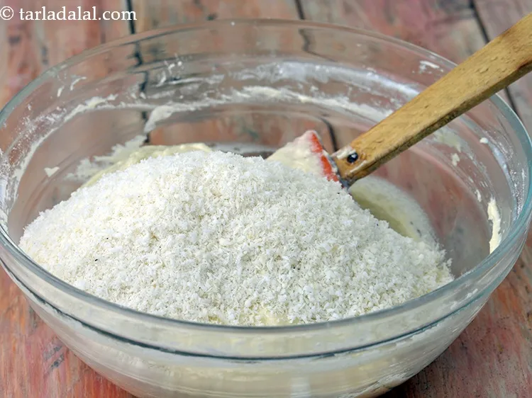 Step 25 – Add 1/2 cup&nbsp;<a href="https://www.tarladalal.com/glossary-desiccated-coconut-272i">desiccated coconut</a>. We do not recommend the use of grated coconut in …