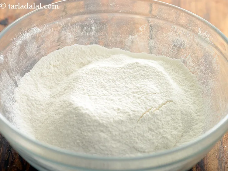 Step 18 – Add the plain flour mixture gradually. This means that you add a part of the …
