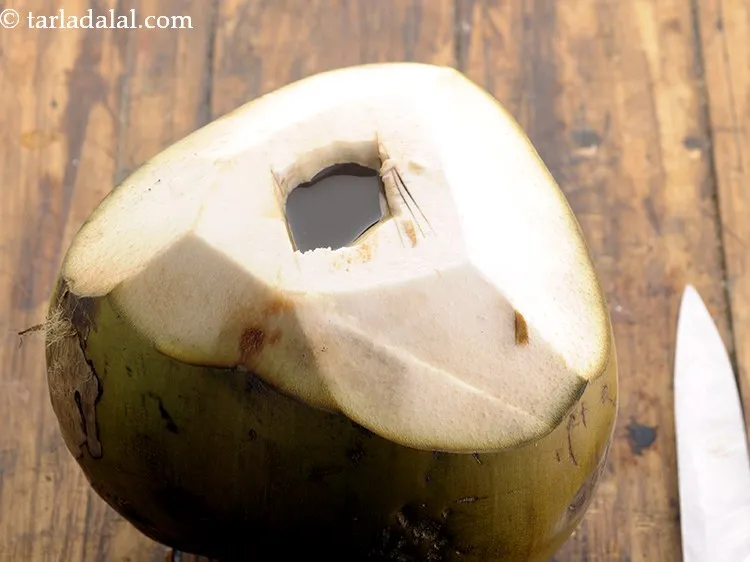 Step 16 – Discard the top shell and open the coconut to get&nbsp;<strong>coconut drink for endurance athletes</strong>.
