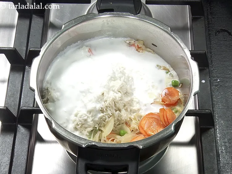 Step 32 – Add the prepared 3/4 cup&nbsp;<a href="https://www.tarladalal.com/glossary-coconut-milk-nariyal-ka-doodh-861i">coconut milk (nariyal ka doodh)</a>. You can also buy readymade …