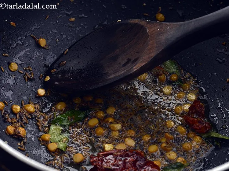 Step 24 – Mix well and saut&eacute; on a medium flame for 1 minute.