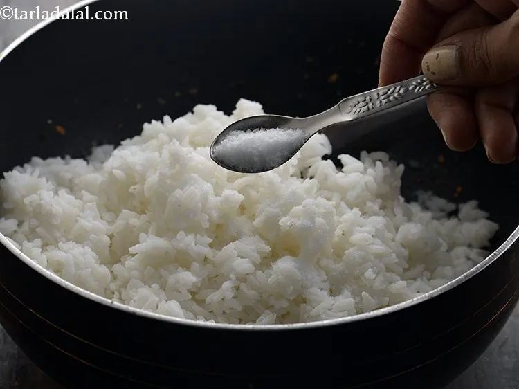 Step 28 – Add the rice and salt. We have added salt while cooking the rice too, so …