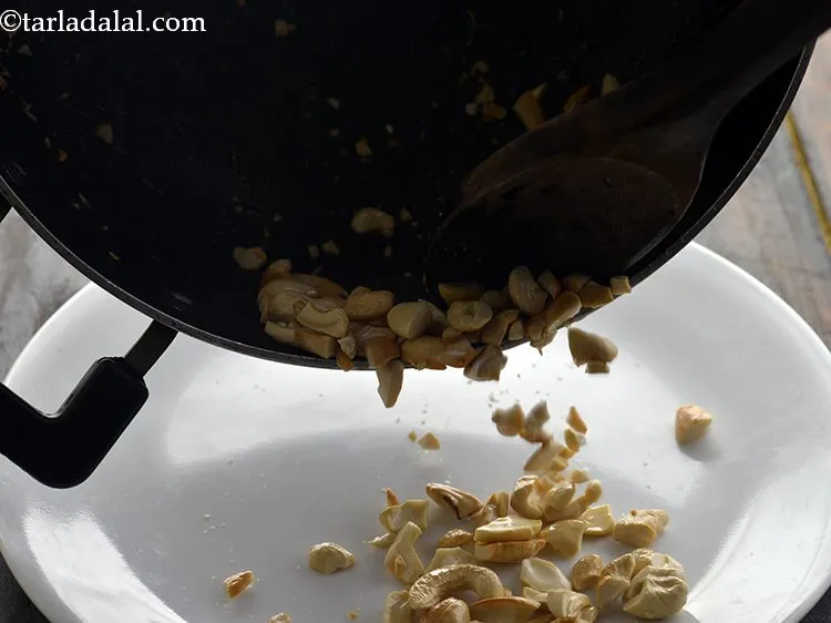 Step 18 – Remove and keep aside. Use peanuts if you do not like cashew nuts.