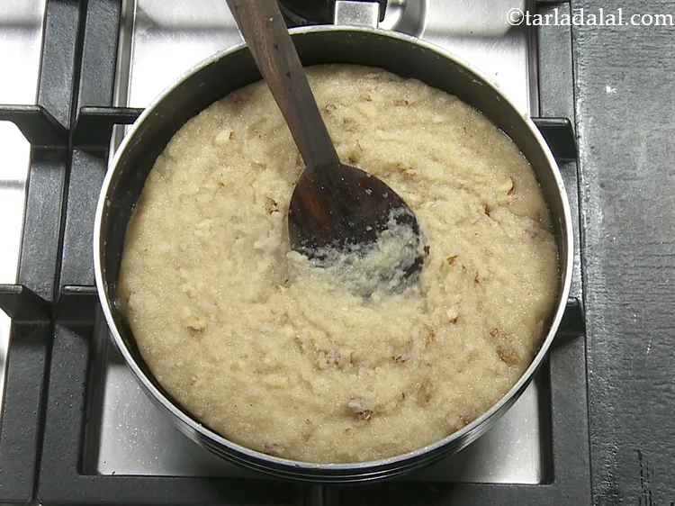 Step 12 – <p>Cook on a medium flame for 7 to 8 minutes or till all the water …