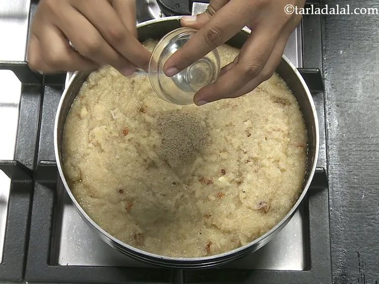 Step 13 – <p>Add the cardamom powder. Elaichi can be swapped with saffron milk for a kesar flavored …