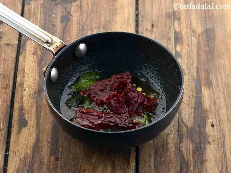 Step 13 – Finally, add broken pieces of Kashmiri red chilli. Saut? on a medium flame for a …