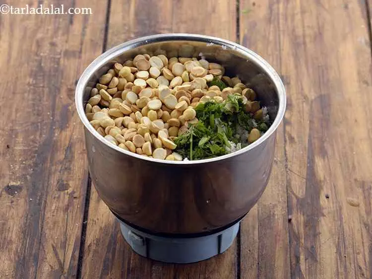 Step 3 – Now add 3 tbsp of roasted chana dal. You can use roasted peanuts instead of …