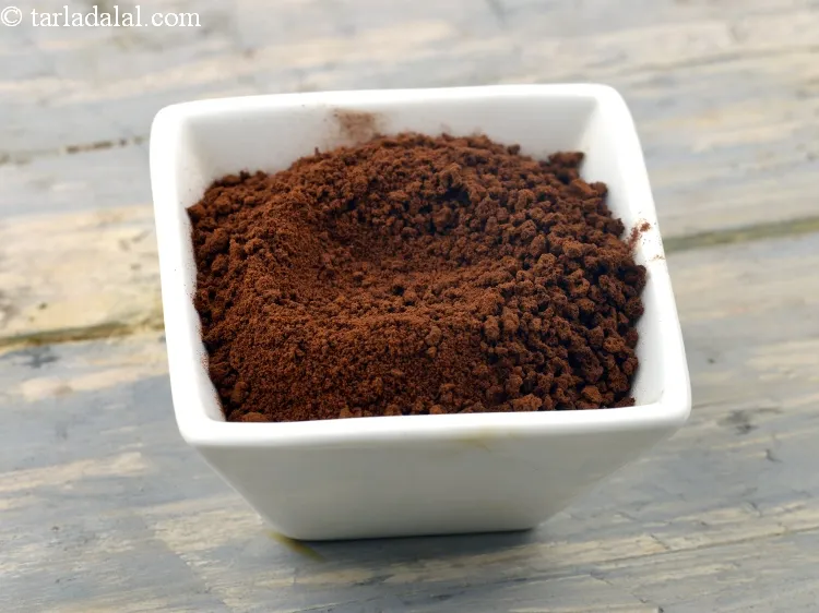 Step 3 – For the coffee- vanilla essence mixture, add 1/2 tsp&nbsp;<a href="https://www.tarladalal.com/glossary-coffee-powder-356i">coffee powder</a> in a microwave safe …