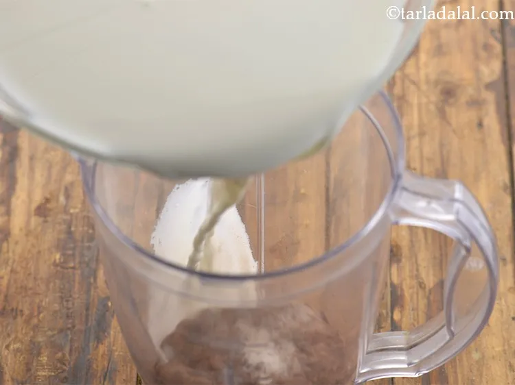 Step 3 – Add chilled full-fat milk. To make the <strong>cocoa chocolate milkshake</strong>, thick and creamy, add vanilla …