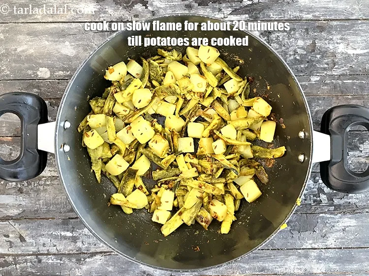 Step 24 – Cook on a slow flame for 20&nbsp;minutes or till the karela is crisp and the …