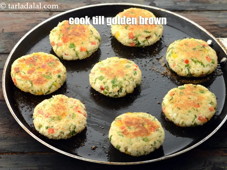 Step 25 – Cook on both sides till they turn golden brown in colour.&nbsp;