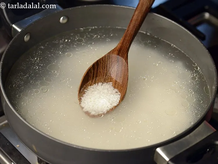 Step 6 – Add the soaked and drained rice.