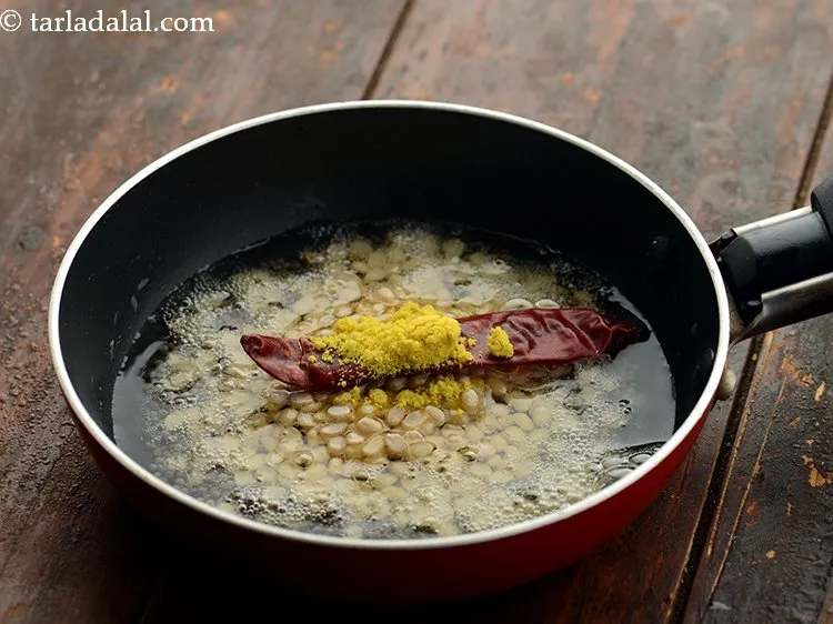 Step 16 – Add hing. You may also use chana dal, cumin seeds, curry leaves, finely chopped chillies …