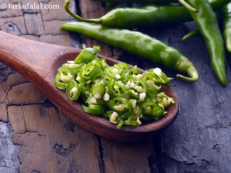 Step 11 – Add finely chopped green chillies. If you wish you can add green chilli paste also.&nbsp;