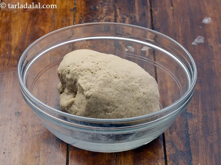 Step 6 – Add enough water and knead into a soft dough. Keep aside.&nbsp;<br /> &nbsp;