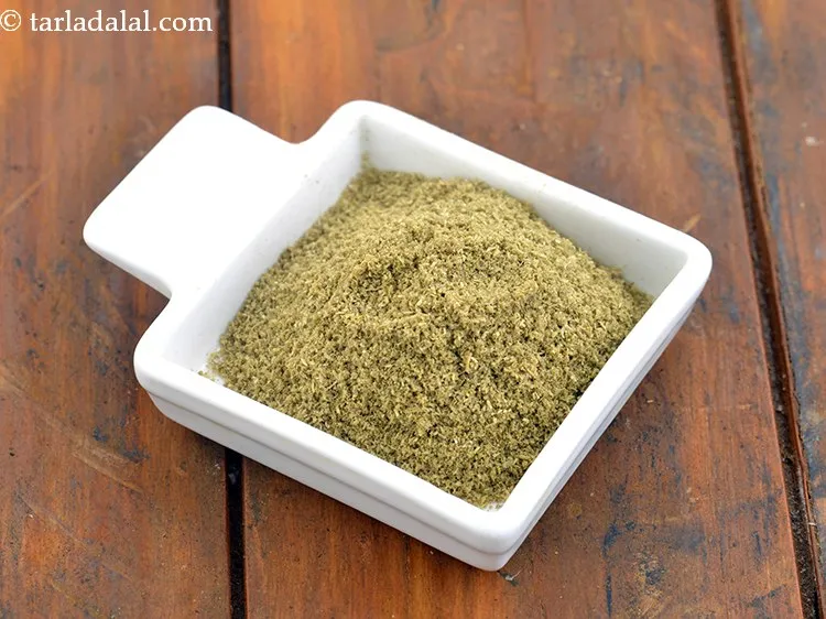 Step 9 – Add masalas to it. First add the coriander cumin seeds powder.