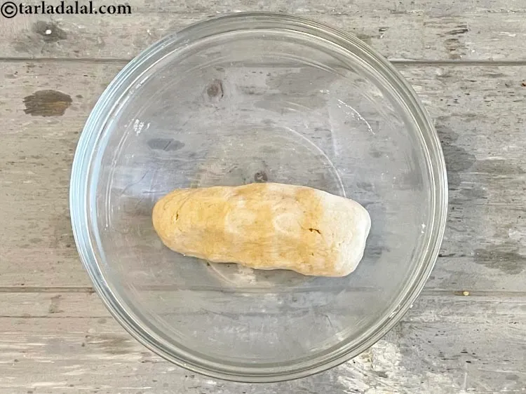 Step 7 – Shape the dough into a cylinderical shape so that it&#39;s easy to break into even …