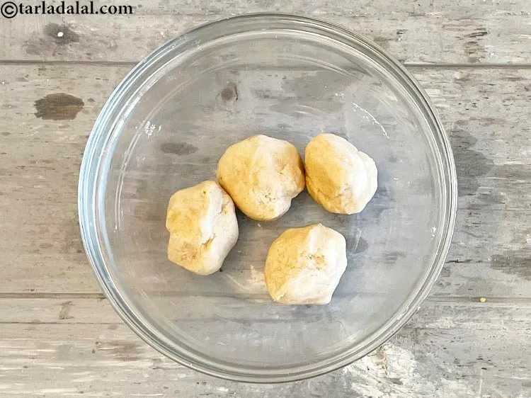 Step 8 – Divide the dough into 4 equal portions and keep aside.