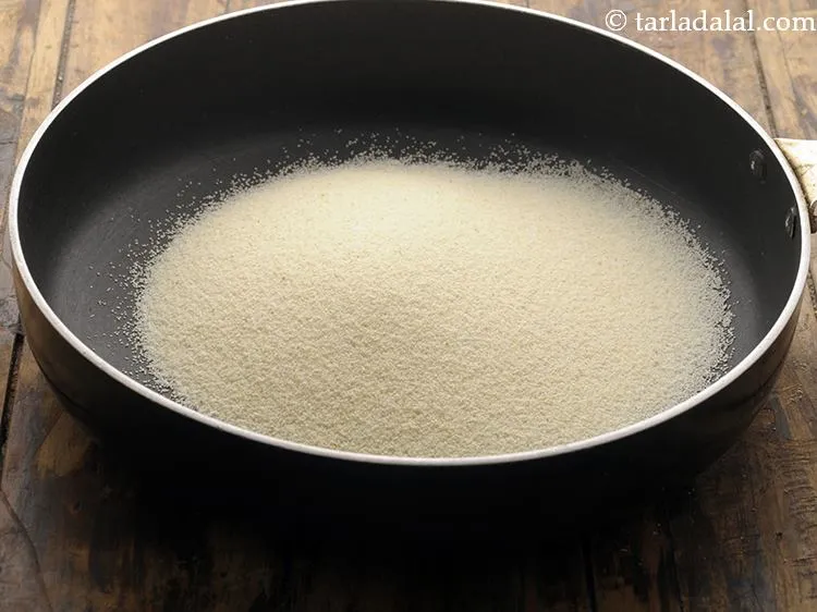 Step 8 – Now, lets make the <strong>Coriander upma</strong>. Take semolina in a broad non stick pan and …