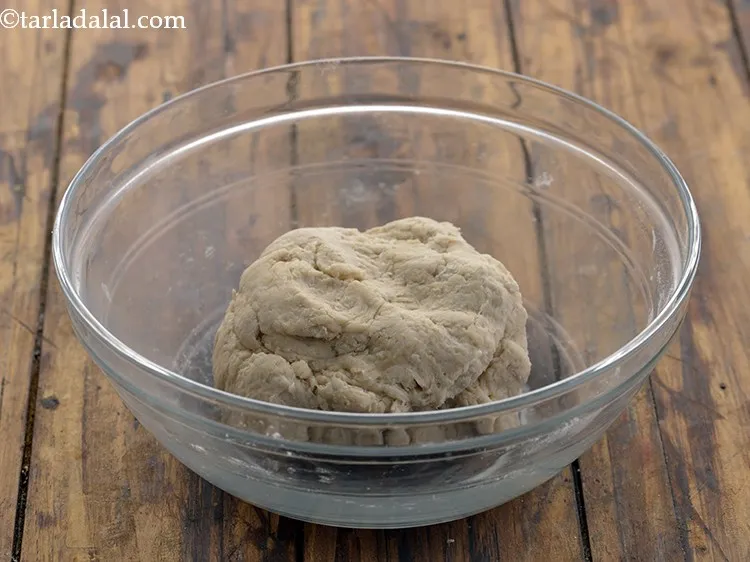 Step 8 – Mix all the ingredients well and knead well into a soft dough using enough water.