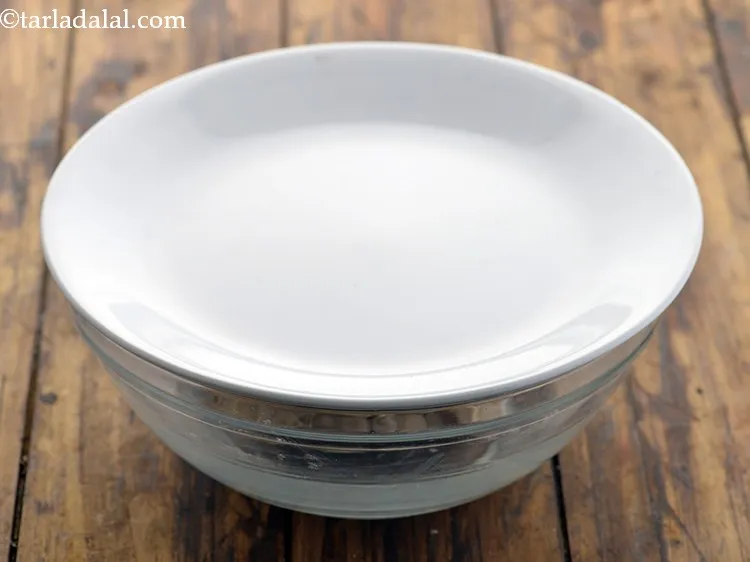 Step 9 – Cover the dough with a lid and keep aside for 30 minutes.