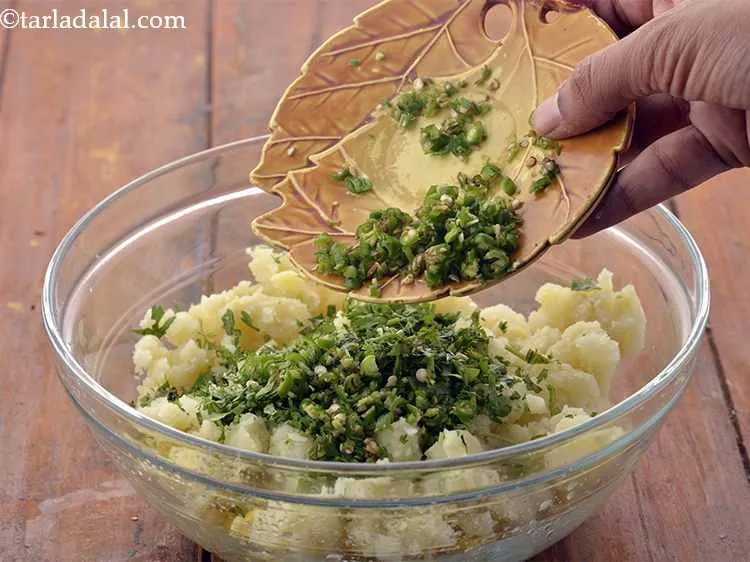 Step 16 – Add the green chillies. Adjust the spice as per the heat you can handle.