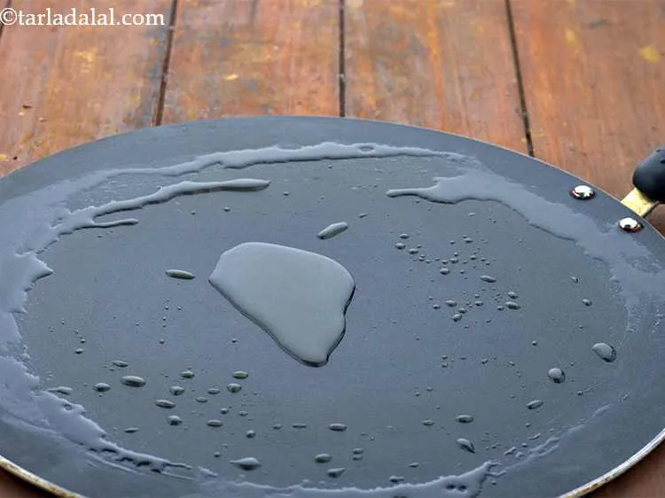 Step 24 – Heat the 1 tbsp oil on a non-stick tava (griddle). If you wish to deep-fry …