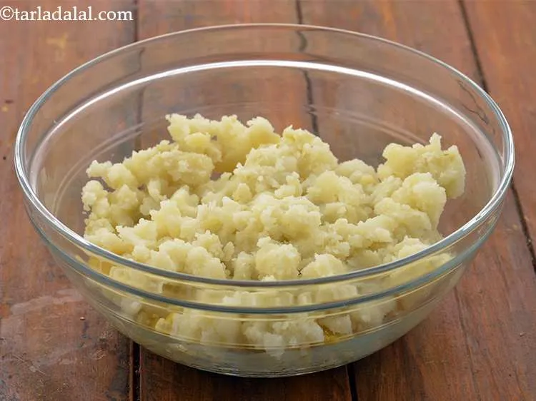 Step 13 – Add the potatoes.