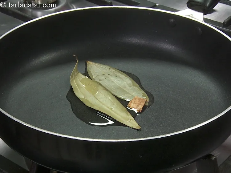 Step 24 – Add 1&nbsp;stick&nbsp;<a href="https://www.tarladalal.com/glossary-cinnamon-dalchini-346i">cinnamon (dalchini)</a>.