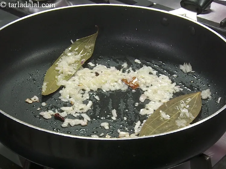 Step 28 – Saut&eacute; on a medium flame for 1 minute.