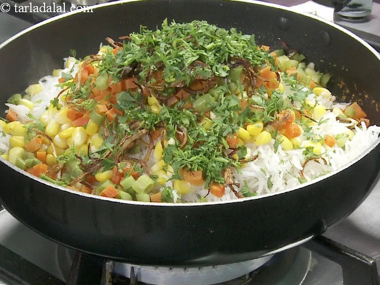 Step 35 – Add 2 tbsp&nbsp;finely&nbsp;<a href="https://www.tarladalal.com/glossary-chopped-coriander-783i">chopped coriander (dhania)</a>.