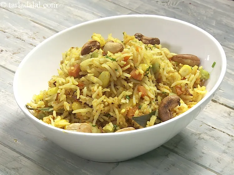 Step 38 – Garnish with 2 tbsp&nbsp;<a href="https://www.tarladalal.com/glossary-fried-cashew-nut-908i">deep-fried cashewnuts</a>.