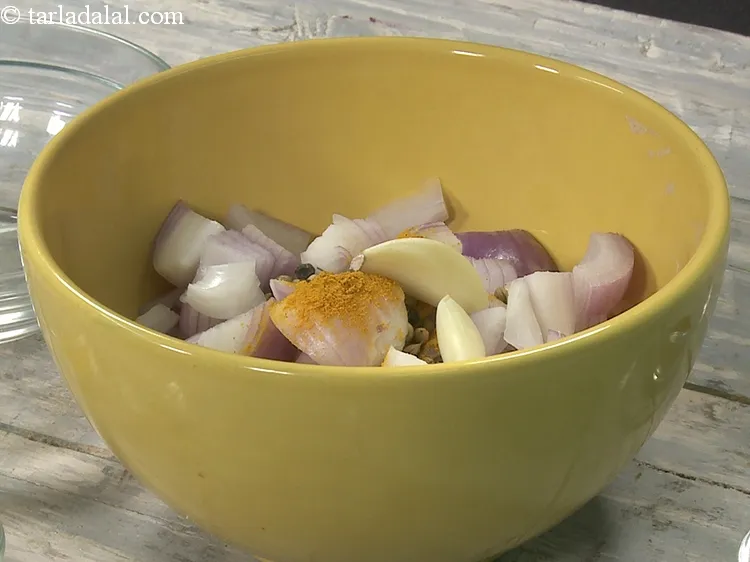 Step 17 – Add 4&nbsp;<a href="https://www.tarladalal.com/glossary-black-peppercorns-kali-mirch-kalimirch-566i">black peppercorns (kalimirch)</a>.