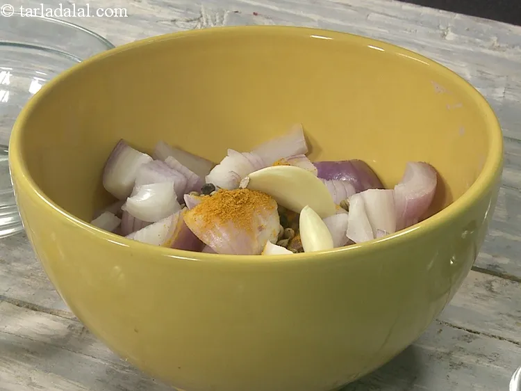 Step 18 – Add 3&nbsp;<a href="https://www.tarladalal.com/glossary-garlic-cloves-1857i">garlic (lehsun) cloves</a>.