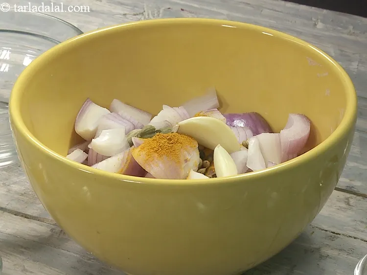 Step 19 – Add 4&nbsp;<a href="https://www.tarladalal.com/glossary-cardamom-elaichi-262i">cardamoms</a>.