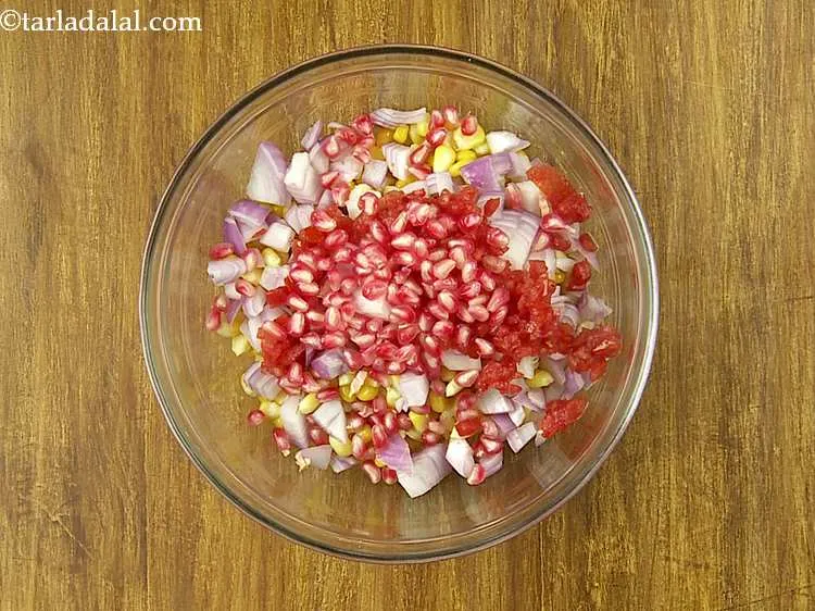 Step 9 – Add the pomegranate. They not only provide a pleasant sweetness to the <strong>corn bhel</strong> but, …