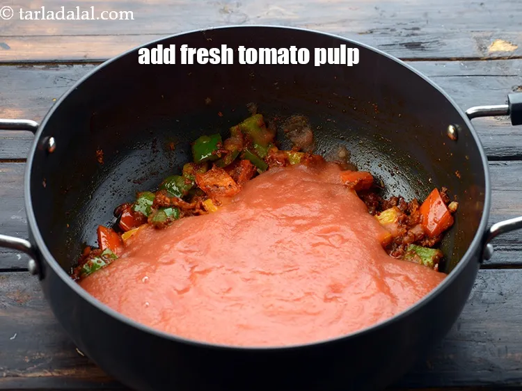 Step 20 – Add 1 1/2 cups fresh&nbsp;<a href="https://www.tarladalal.com/glossary-tomato-pulp-tamatar-ka-pulp-1039i">tomato pulp</a>. This can be made in advance and kept.&nbsp;