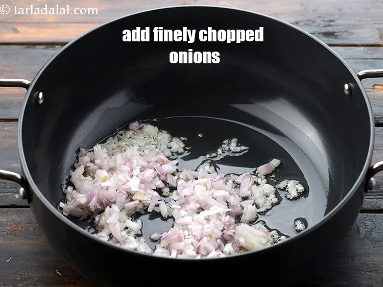 Step 11 – Add 1/2 cup&nbsp;finely&nbsp;<a href="https://www.tarladalal.com/glossary-chopped-onions-722i">chopped onions</a>.&nbsp;