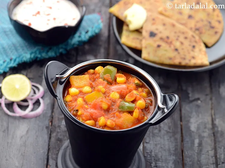 Step 29 – This subzi should be served with kulcha and raita for a complete meal.&nbsp;