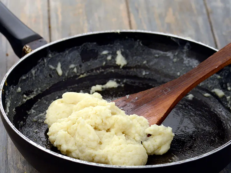Step 5 – Keep on stirring and cooking till the mixture thickens and leaves the sides of the …