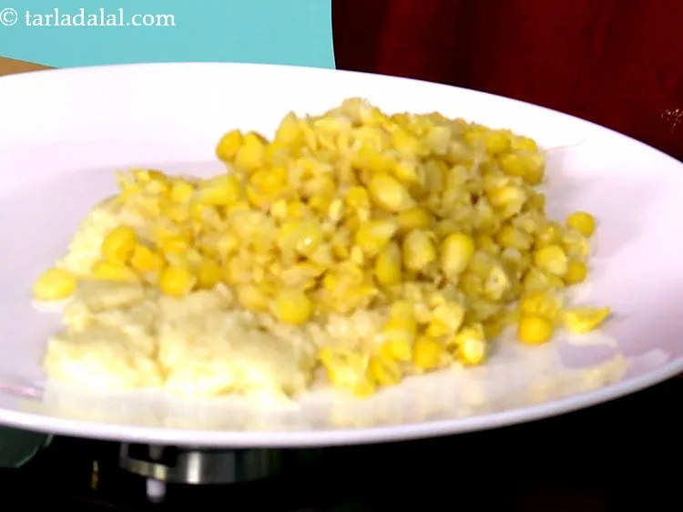 Step 7 – Add the boiled and crushed sweet corn to the thick white sauce.