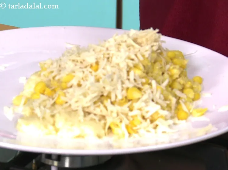 Step 8 – Add grated processed cheese. Corn and cheese is a lip-smacking combo and here we have …
