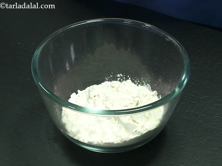 Step 2 – For preparing the pancake batter for <strong>Enchiladas</strong>, in a deep bowl take refined flour.