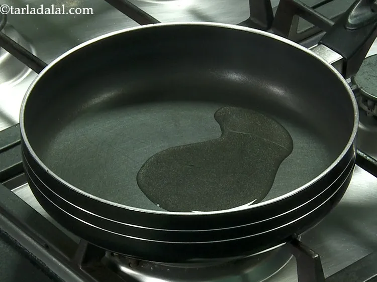 Step 12 – For the<strong> Corn enchiladas</strong> filling, heat the oil in a broad non-stick pan. You can …