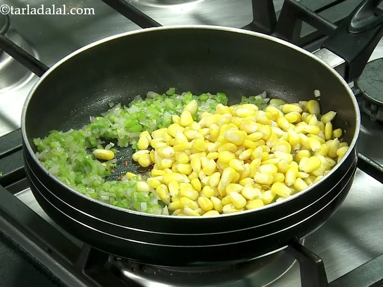 Step 19 – Add corn. For this recipe, we have boiled the corn kernels in a microwave before …