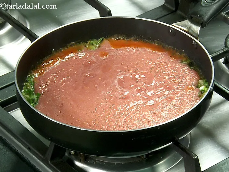 Step 30 – Furthermore, add the tomato-onion mixture.